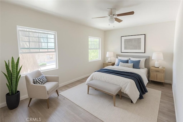 2716 W 54th St, Los Angeles, CA 90043 - bedroom featuring light wood-type flooring and a ceiling fan
