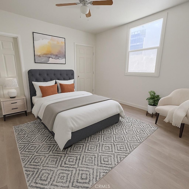 2716 W 54th St, Los Angeles, CA 90043 - bedroom with wood finished floors and ceiling fan