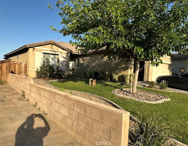 12835 Mesa View Dr, Victorville, CA 92392 - ranch-style home featuring a garage and stucco siding