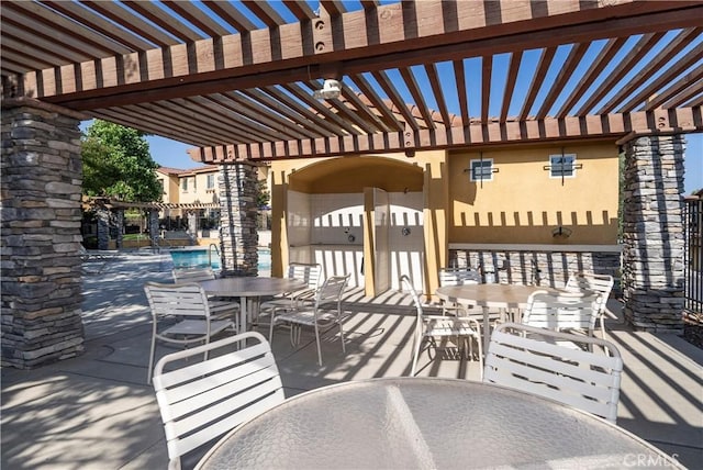 8022 Cresta Bella Rd, Rancho Cucamonga, CA 91730 - view of patio with outdoor dining space and a pergola