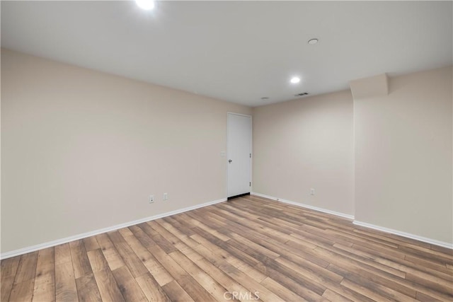 8022 Cresta Bella Rd, Rancho Cucamonga, CA 91730 - spare room with light wood-style floors and recessed lighting
