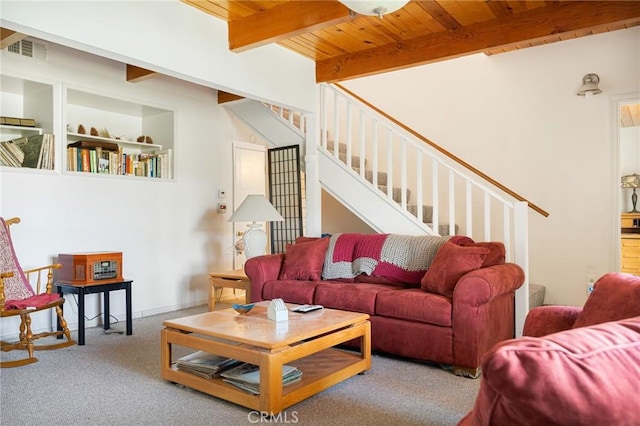 30400 Live Oak Dr, Running Springs, CA 92382 - living room featuring a wood ceiling with exposed beams, stairs, and carpet flooring
