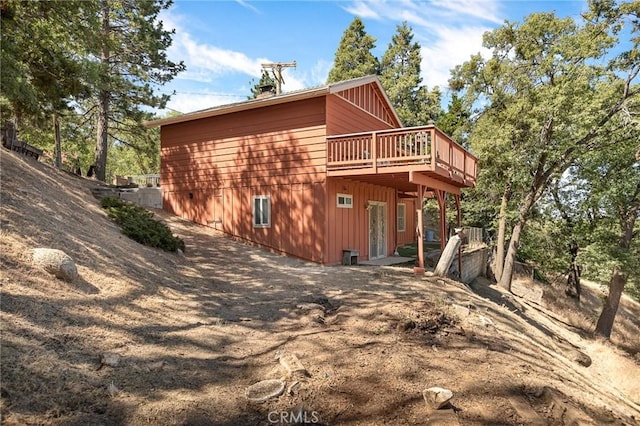 30400 Live Oak Dr, Running Springs, CA 92382 - view of side of home featuring a deck
