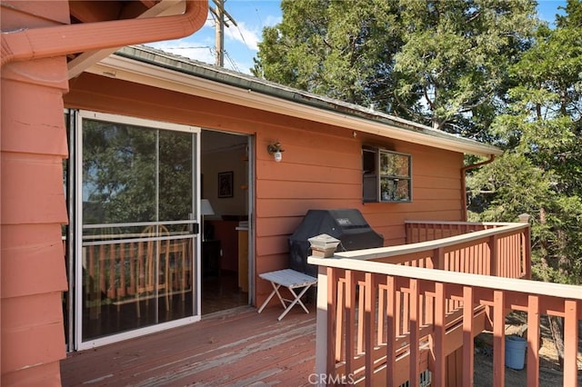 30400 Live Oak Dr, Running Springs, CA 92382 - wooden deck with a grill