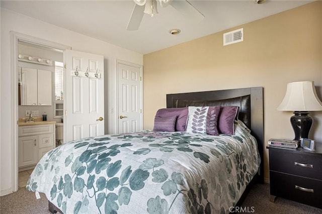 30400 Live Oak Dr, Running Springs, CA 92382 - carpeted bedroom featuring connected bathroom and ceiling fan