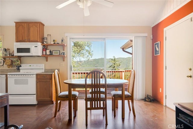 30400 Live Oak Dr, Running Springs, CA 92382 - dining room featuring a ceiling fan and dark wood-style flooring