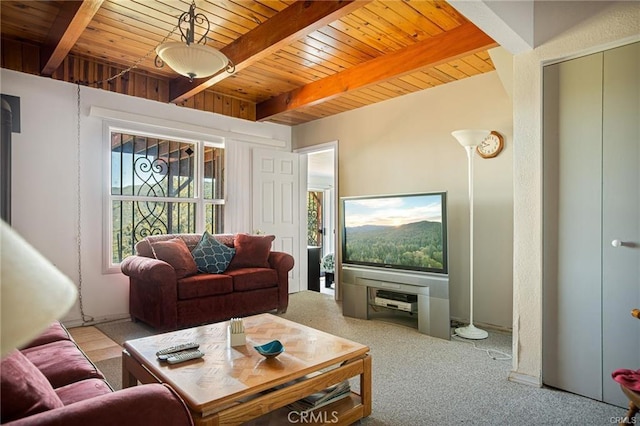 30400 Live Oak Dr, Running Springs, CA 92382 - living room featuring a wooden ceiling with exposed beams and carpet floors
