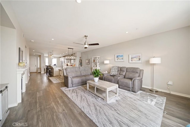 4048 Tradewinds Dr, Oxnard, CA 93035 - living room featuring ceiling fan, dark wood-style floors, and recessed lighting