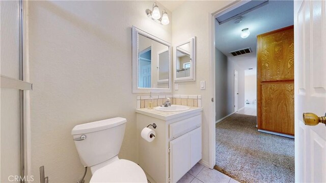19171 Carlisle Rd, Apple Valley, CA 92307 - bathroom with vanity and tile patterned floors