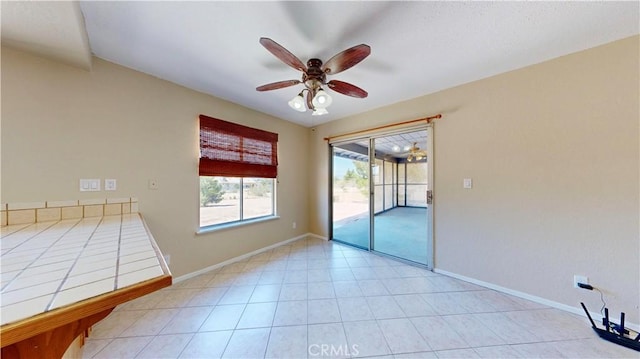 19171 Carlisle Rd, Apple Valley, CA 92307 - empty room featuring ceiling fan and baseboards