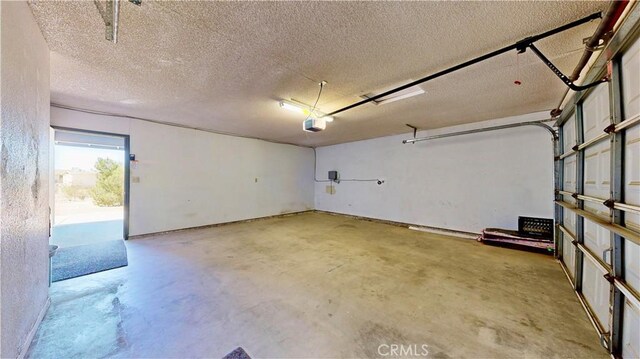 19171 Carlisle Rd, Apple Valley, CA 92307 - garage with a garage door opener