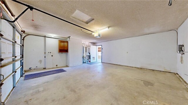 19171 Carlisle Rd, Apple Valley, CA 92307 - garage featuring a garage door opener