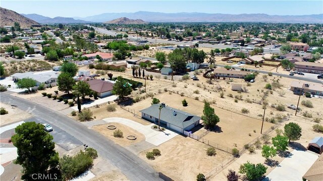 19171 Carlisle Rd, Apple Valley, CA 92307 - aerial view of residential area featuring a mountain backdrop