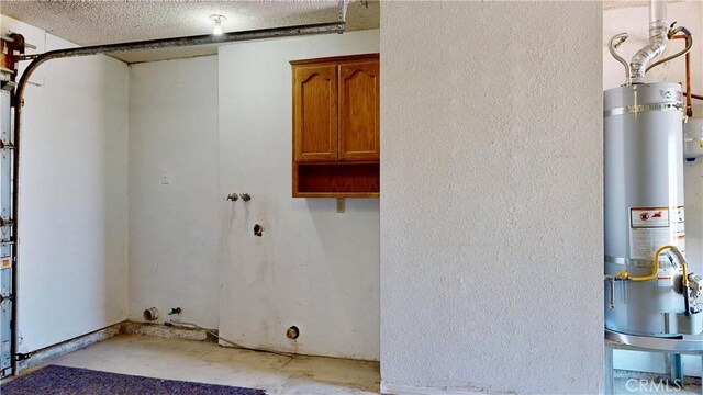 19171 Carlisle Rd, Apple Valley, CA 92307 - washroom with water heater, a textured ceiling, and a textured wall