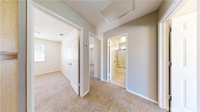 19171 Carlisle Rd, Apple Valley, CA 92307 - corridor featuring carpet and attic access