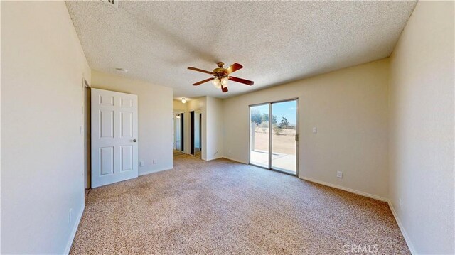 19171 Carlisle Rd, Apple Valley, CA 92307 - carpeted spare room with ceiling fan and a textured ceiling