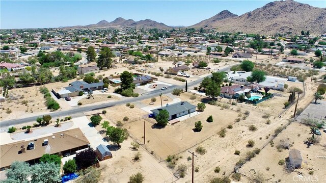19171 Carlisle Rd, Apple Valley, CA 92307 - aerial perspective of suburban area with mountains