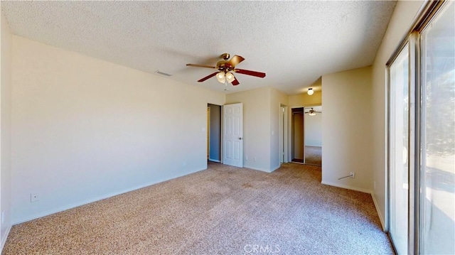 19171 Carlisle Rd, Apple Valley, CA 92307 - unfurnished room featuring a ceiling fan, light colored carpet, and a textured ceiling