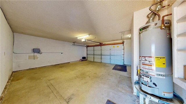 19171 Carlisle Rd, Apple Valley, CA 92307 - garage featuring secured water heater and a garage door opener