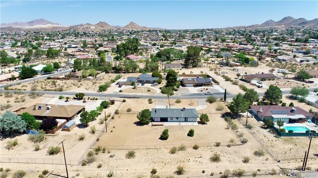 19171 Carlisle Rd, Apple Valley, CA 92307 - aerial perspective of suburban area with a mountainous background