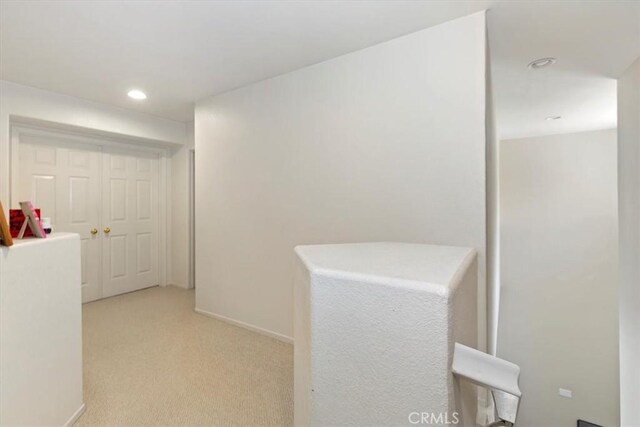 7509 Woodstream Ct, Rancho Cucamonga, CA 91739 - corridor with light colored carpet and recessed lighting