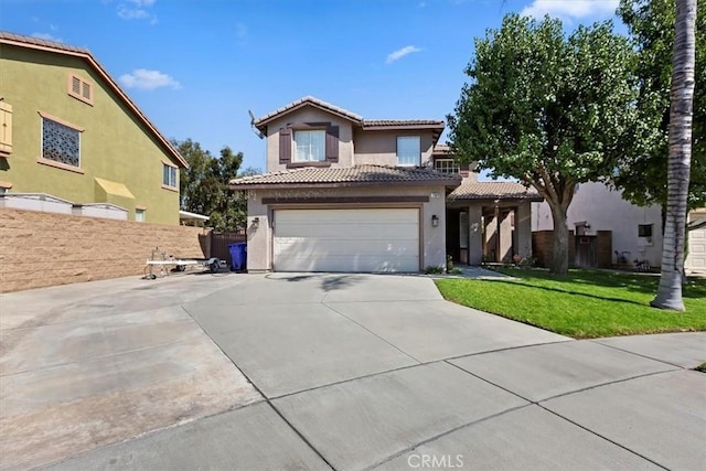 7509 Woodstream Ct, Rancho Cucamonga, CA 91739 - view of front of home featuring stucco siding, a tile roof, and driveway