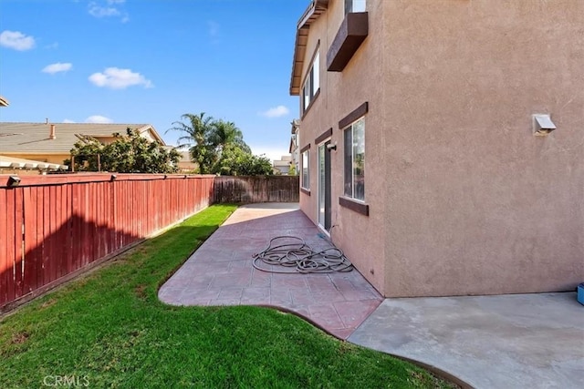 7509 Woodstream Ct, Rancho Cucamonga, CA 91739 - fenced backyard with a patio area