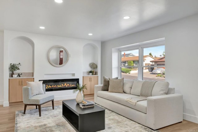 1665 Yale St, Chula Vista, CA 91913 - living area featuring light wood-type flooring, recessed lighting, and a glass covered fireplace