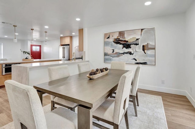 1665 Yale St, Chula Vista, CA 91913 - dining area with light wood-type flooring and recessed lighting