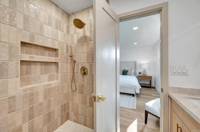 1665 Yale St, Chula Vista, CA 91913 - full bathroom featuring ensuite bathroom, wood finished floors, a tile shower, and vanity