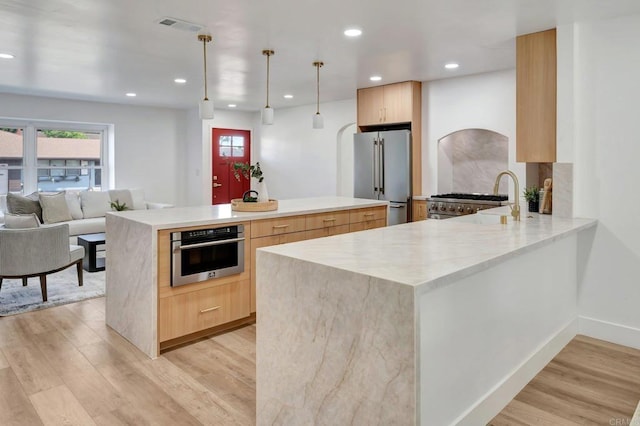 1665 Yale St, Chula Vista, CA 91913 - kitchen featuring appliances with stainless steel finishes, modern cabinets, light brown cabinets, and recessed lighting