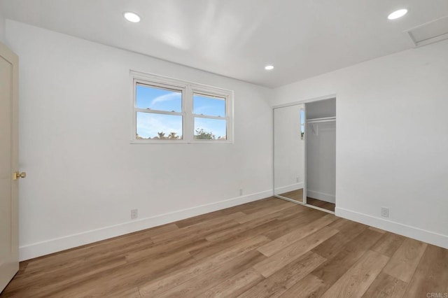 1665 Yale St, Chula Vista, CA 91913 - unfurnished bedroom featuring light wood-style floors, attic access, recessed lighting, and a closet