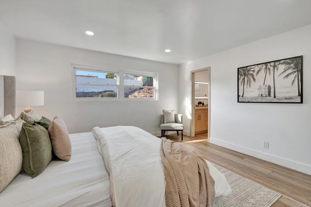 1665 Yale St, Chula Vista, CA 91913 - bedroom with light wood-style flooring, recessed lighting, and ensuite bathroom