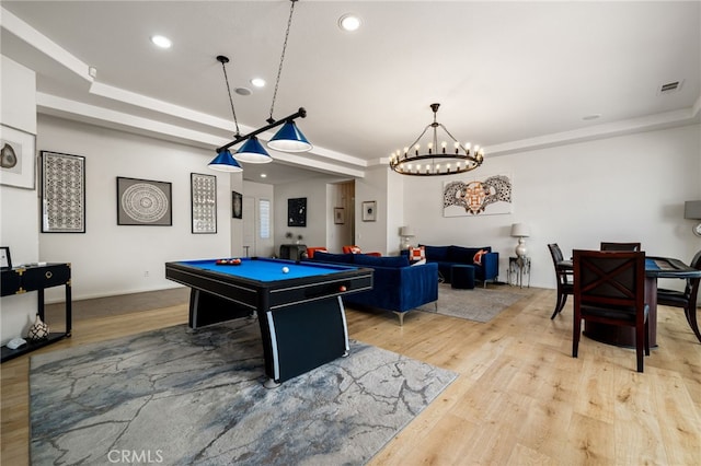 43875 Spiaggia Pl, Indio, CA 92203 - game room with billiards, recessed lighting, light wood-style flooring, a tray ceiling, and a chandelier