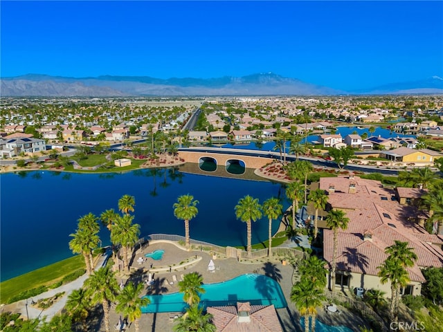 43875 Spiaggia Pl, Indio, CA 92203 - aerial perspective of suburban area featuring a water and mountain view and a pool area