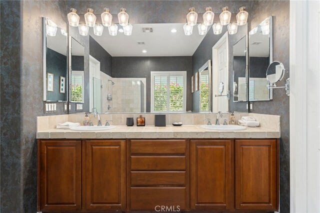 43875 Spiaggia Pl, Indio, CA 92203 - bathroom featuring double vanity and tiled shower