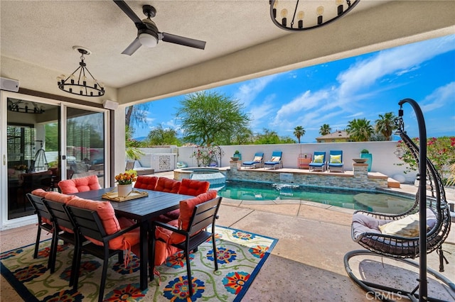43875 Spiaggia Pl, Indio, CA 92203 - fenced backyard with a patio, ceiling fan, and a pool with connected hot tub