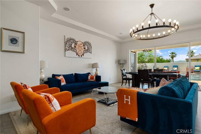 43875 Spiaggia Pl, Indio, CA 92203 - living area featuring a chandelier and a raised ceiling