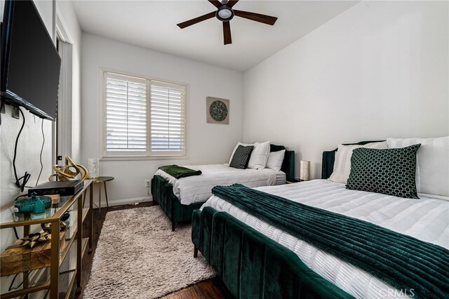 43875 Spiaggia Pl, Indio, CA 92203 - bedroom with wood finished floors, ceiling fan, and vaulted ceiling