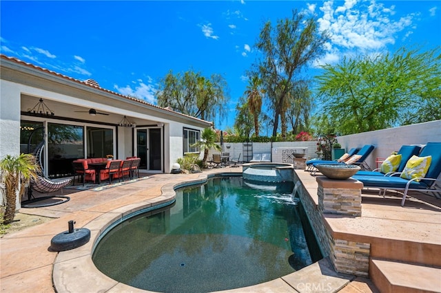 43875 Spiaggia Pl, Indio, CA 92203 - view of pool featuring a patio, ceiling fan, a pool with connected hot tub, and an outdoor living space