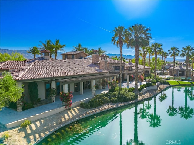 43875 Spiaggia Pl, Indio, CA 92203 - view of swimming pool featuring a mountain view and a patio area