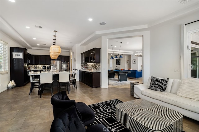 43875 Spiaggia Pl, Indio, CA 92203 - living room featuring a tray ceiling, recessed lighting, and pool table