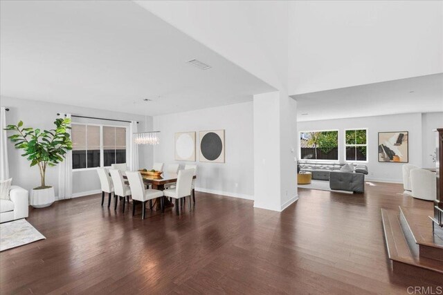 7147 Sitio Bahia, Carlsbad, CA 92009 - dining space featuring wood finished floors and baseboards