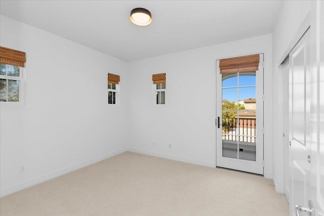 7147 Sitio Bahia, Carlsbad, CA 92009 - empty room with light colored carpet and baseboards
