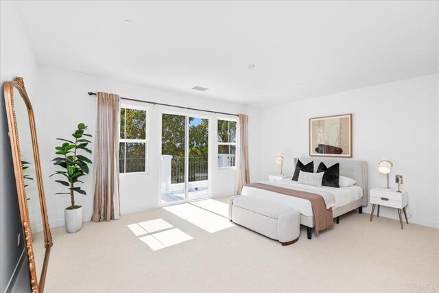 7147 Sitio Bahia, Carlsbad, CA 92009 - bedroom with access to outside and carpet