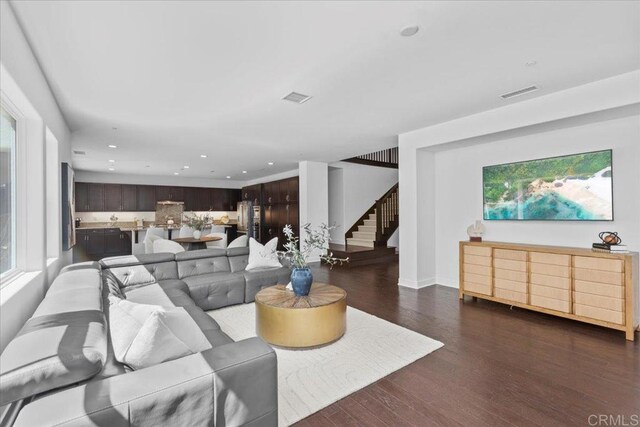 7147 Sitio Bahia, Carlsbad, CA 92009 - living room with stairway, wood finished floors, and recessed lighting