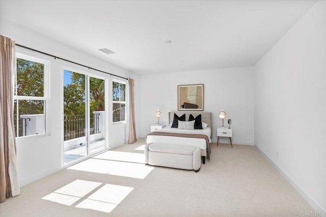 7147 Sitio Bahia, Carlsbad, CA 92009 - bedroom featuring access to exterior and carpet floors