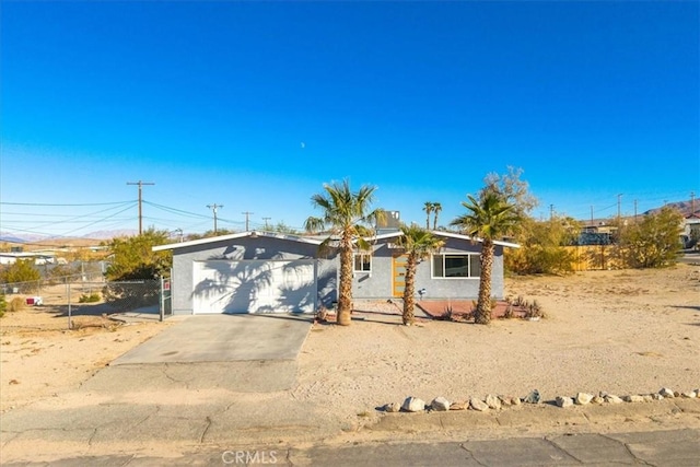 7227 Sherman Hoyt Ave Unit 29, Palms, CA 92277 - single story home with a garage and driveway