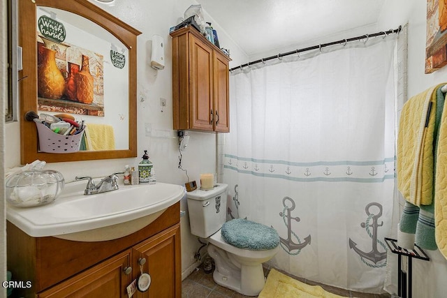 656 W Hemlock St, Port Hueneme, CA 93041 - full bath featuring vanity, a shower with shower curtain, and tile patterned floors