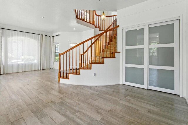 2344 Greenbriar Dr Unit A, Chula Vista, CA 91915 - foyer entrance with wood finished floors, stairs, and a chandelier